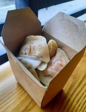 Dumplings with sauce at Sho Sho VEGAN - ШОШО VEGAN in Kyiv