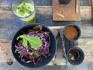 Hipster traditional mexican breakfast and green juice at Líquido y Sólido in Tulum
