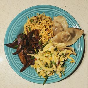 Clockwise from top: Somen noodles, Three Treasures dumplings, Napa salad, Sweet & Sour eggplant  at Bao Bao Dumpling House in Brunswick