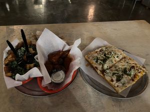 That’s my boy Jimmy on the right. Buffalo wings and Caesar kale on the left. (Check out those croutons!)  at Boxcar Pizza in Portland