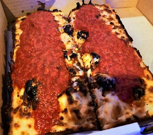 The picture doesn't do the pizza justice- IT'S  SO GOOD at Boxcar Pizza in Portland