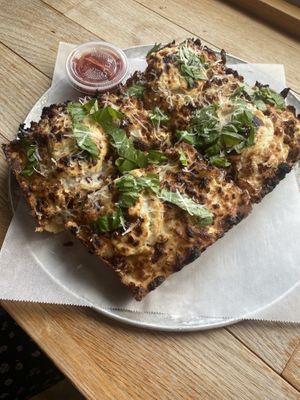 Bianca Pizza with side of red saucee  at Boxcar Pizza in Portland