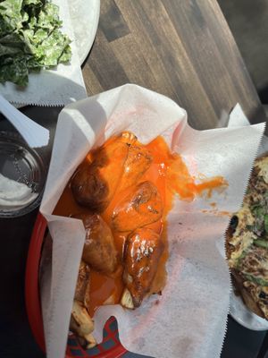 Buffalo hot wings. Frankly, way too much sauce. But still delish!  at Boxcar Pizza in Portland
