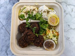 Falafel Plate with hummus, cabbage salad, tahini. at TLV in Austin