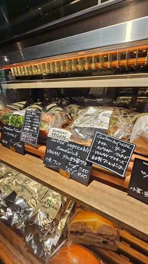 glass counter with vegan sandwich at Morethan Bakery in Tokyo
