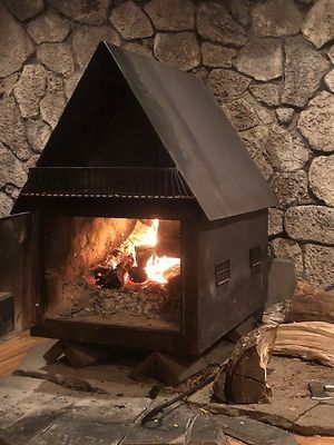 Our restaurant is heated by a blazing wood stove at Al Forno Ferruzza Pizza in Rhododendron