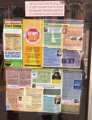 Weird anti-Covid conspiracy theories on their door.  at Country Life in Keene