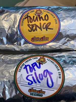 Color-coded stickers for vegan and non-vegan foods at Señor Sisig in San Francisco