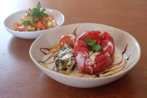 Stuffed vegetables on bio probiotic soy yogurt at A Tribo in Barao De Sao Joao