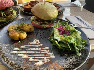 Beyond Burger with smashed potatoes at A Tribo in Barao De Sao Joao