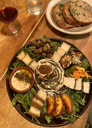 Vegan cheese starter dish with whole spelt bread   at A Tribo in Barao De Sao Joao