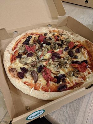 Build your own vegan pizza, mushrooms, olives, artichokes, and slow roasted tomatoes at Pure Pizza in Edinburgh