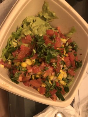 Corn , lettuce guacamole, pico de gallo , cilantro   at Moho Mexican Grill in Bayside