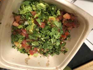 Corn , lettuce guacamole, pico de gallo , cilantro  at Moho Mexican Grill in Bayside