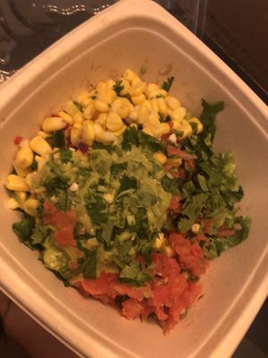 Corn , lettuce guacamole, pico de gallo , cilantro  at Moho Mexican Grill in Bayside