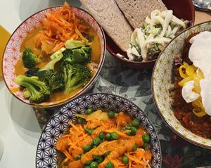 the tibetan mama, vegetable tajine, young coconut ceviche, and the spicy chili sin carne at Le Botaniste - UWS in New York City