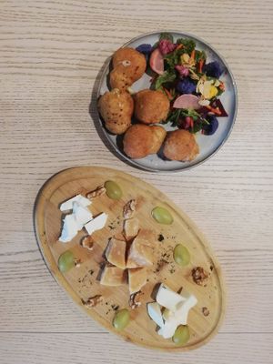 This is a vegetarian option on the menu, cheese plate & some savory snacks. at The Garden Cafe & Restaurant in Budapest