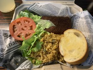 Alcapurria combo - fried plantain fritter stuffed with beyond meat and yellow rice with pigeon peas at 100% HP in San Juan