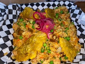 Paella de carne con tostones  at 100% HP in San Juan