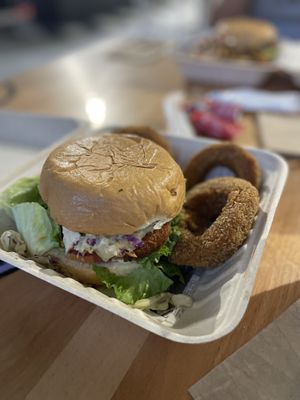 The chicken sandwich with onion rings   at 100% HP in San Juan