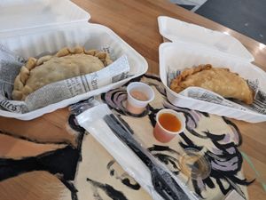 Broccoli and cheddar Empanada, and Seafood Empanada at 100% HP in San Juan