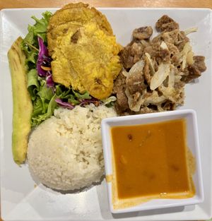 Mixed “carne” plate with red beans, rice, tostones and avocado   at 100% HP in San Juan