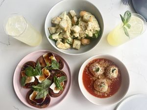 Caprese, Caesar salad, and aracini   at Sestina - Culver City in Culver City