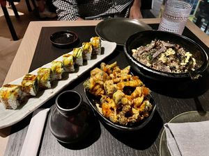 Dragon Roll, Bang Bang Broccoli (spicy), and Truffle Fried Rice. at PLANTA Queen  in Coconut Grove