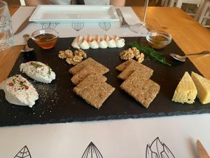 Cheese platter with rice-based ‘honey’ to accompany the ‘ricotta’, a creamy cheese dip, and a hard cheese with fig chutney. We cleared the board with parts of our second co at Nativa in Rome
