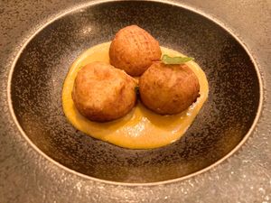 Malay kofta with curry sauce: vegan ricotta balls with lentil dhal filling  at Nativa in Rome