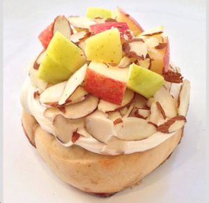 Vanilla Frosting, Crunchy Apples, and Sliced Almonds! at Cinnaholic in Cypress