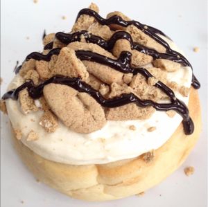 Creme Brulee Frosting with Cookie Bites & Chocolate Sauce! at Cinnaholic in Tulsa