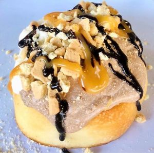 Twix! Caramel & Chocolate Frosting, Graham Cookies, Caramel Sauce, and Chocolate Sauce at Cinnaholic in Tulsa