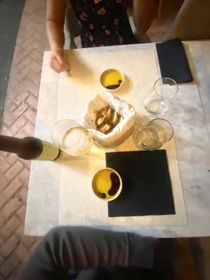 Complementary raisin bread and oil at Hectors Kitchen in Punta De Mita