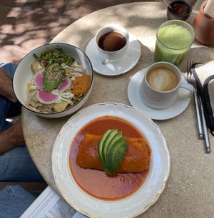 chilaquiles, burrito, jugo verde, latte with oat milk, and an americano--all absolutely delicious!   at La Cabra Iluminada in San Miguel De Allende