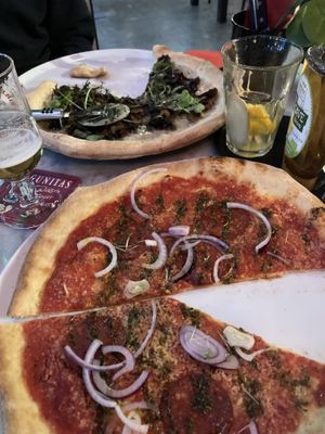 Truffle pizza in the back, don’t remember the name of mine  at Vegan Pizza Bar in Rotterdam