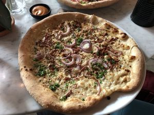 Pizza carbonara with Smokey bacon mayo crust dipper  at Vegan Pizza Bar in Rotterdam