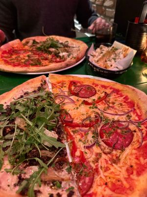 Sala Mommy & Savage Sausage pizza.  at Vegan Pizza Bar in Rotterdam