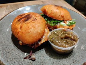 Potato pambazo (potato patty in a bun) with hot salsa at Ojo de Maíz in Mexico City
