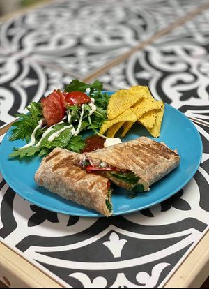 The ever popular Cool Beans Fancy Wrap .. stuffed with our cashew cheese , seitan and loooaaadsa salad dressed with Mayo or sriracha Mayo  at The V Hub in Swansea