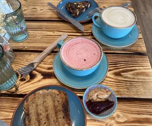 Macha and beetroot health lates, gf tifin bar and banana bread with jam and pb  at The V Hub in Swansea