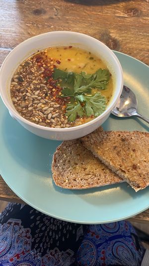 Lentil daal seasoned with a mix of seeds plus sexy coriander! Oh and a fresh side of tossed sourdough!   at The V Hub in Swansea
