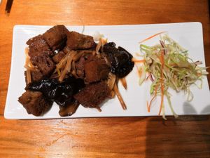 Wheat Gluten Stew with Brown Sauce 四喜烤夫 at Yuán Shàn SùShí 圓善素食 in Kowloon