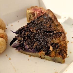 thick farinata - frittata hybrid, here's made with diff beans and cavolo at La Schiscetteria in Milan