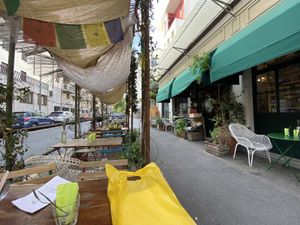 Street tables  at La Schiscetteria in Milan