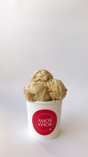 Our traditional Arabic Coffee ice cream, crafted from beans harvested from the dry mountains of Yemen, infused with organic Medjool dates, a true Arabian social. at Amor Amor in Doha