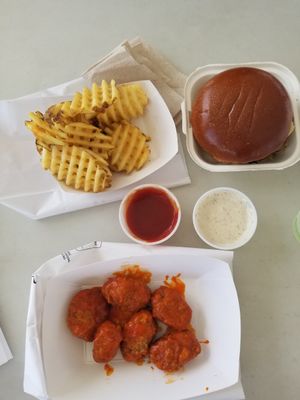 Waffle fries, buffalo wings, godfather burger at Meta Burger in Edgewater