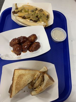 Hangover chicken sammy, Wings, and Philly cheesesteak.  at Meta Burger in Edgewater