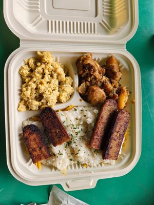 Vegan eggs, potatoes, grits with cheese and sausage at C4Eats in Hollywood