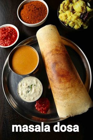 Masala dosa with coconut chutney and Tomato chutney  at Turmeric Kitchen 65 in Taunton